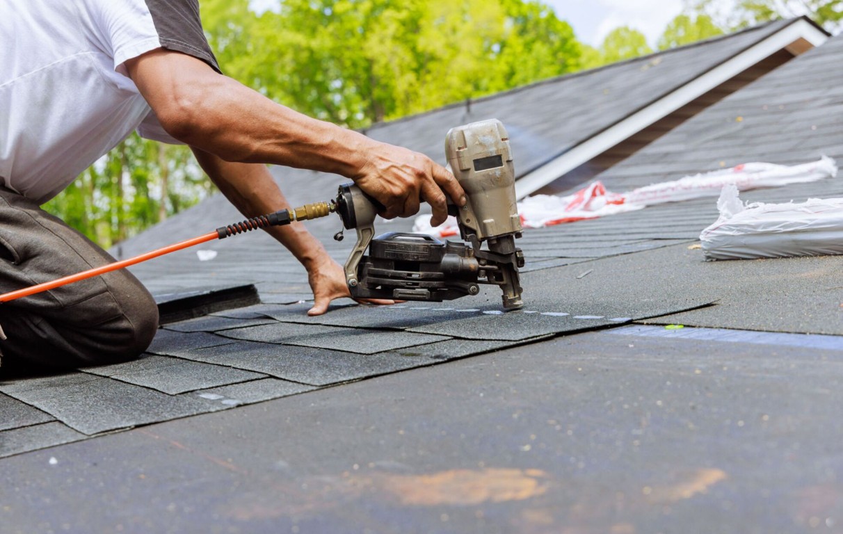 Professional roofer installing shingles in La Mirada